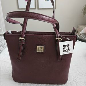 Brand new never used burgundy Ann Klein hand bag